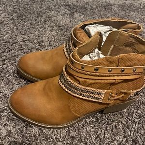 Brand new short cowgirl boots. Very cute